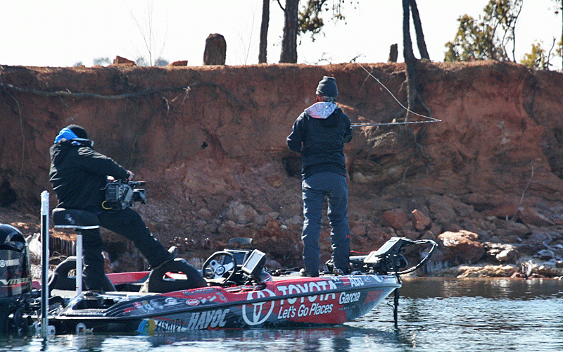 Mike Iaconelli casts to a rocky bank midday during Day 1 of the 2015 GEICO Bassmaster Classic presented by GoPro.