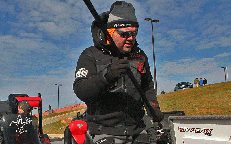 Toyota Bassmaster Angler of the Year stows away his rods as he begins his trek to Greenville for the weigh-in.