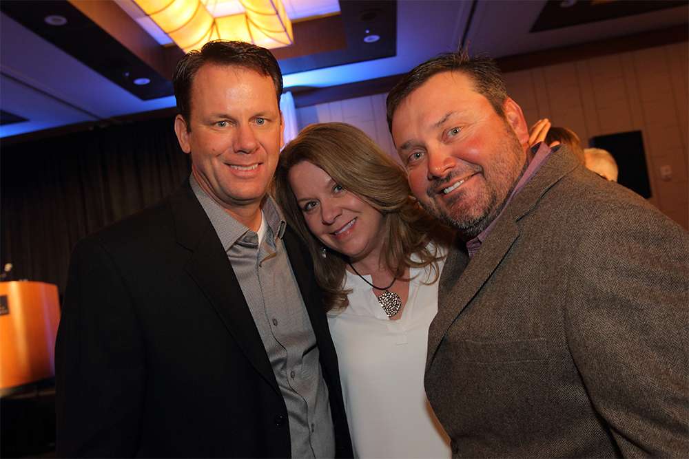 Mr. and Mrs. Kevin VanDam pose with Greg Hackney.