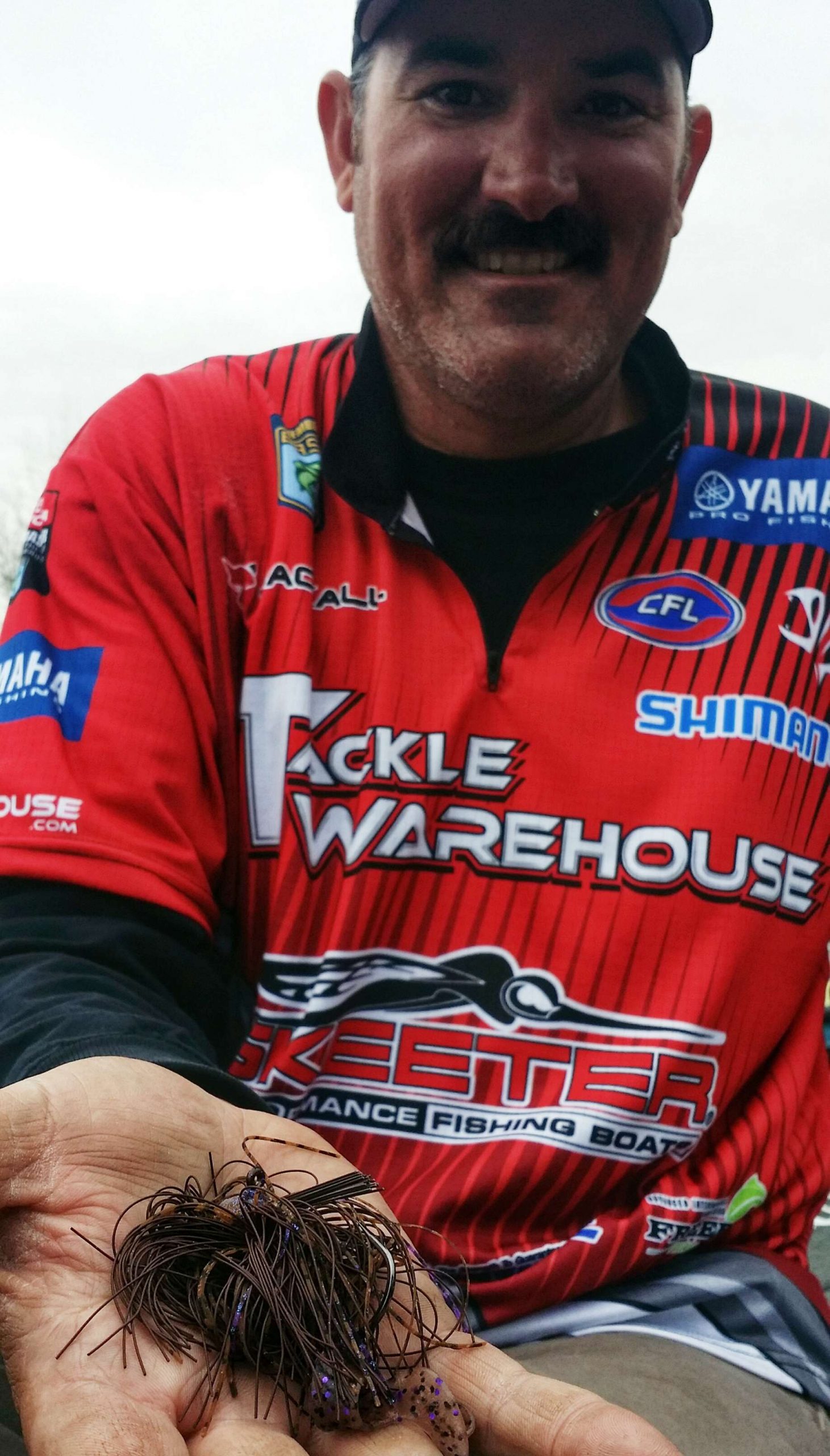 Jared Lintner weighed most of his fish on two 3/4-oz jigs: an Eco Pro Tungsten jig (for rocks) and a G Money Fooball Jig. Both were pb&j-colored with twin-tail grubs (smoke/purple flake). He explained that the tungsten jig makes a different sound when it hits rocks. His fish were in 30-40 feet in main-river creek mouths, and the key was dragging the jig until it contacted rocks or brush. When that happened, he'd shake the jig and then get bit.