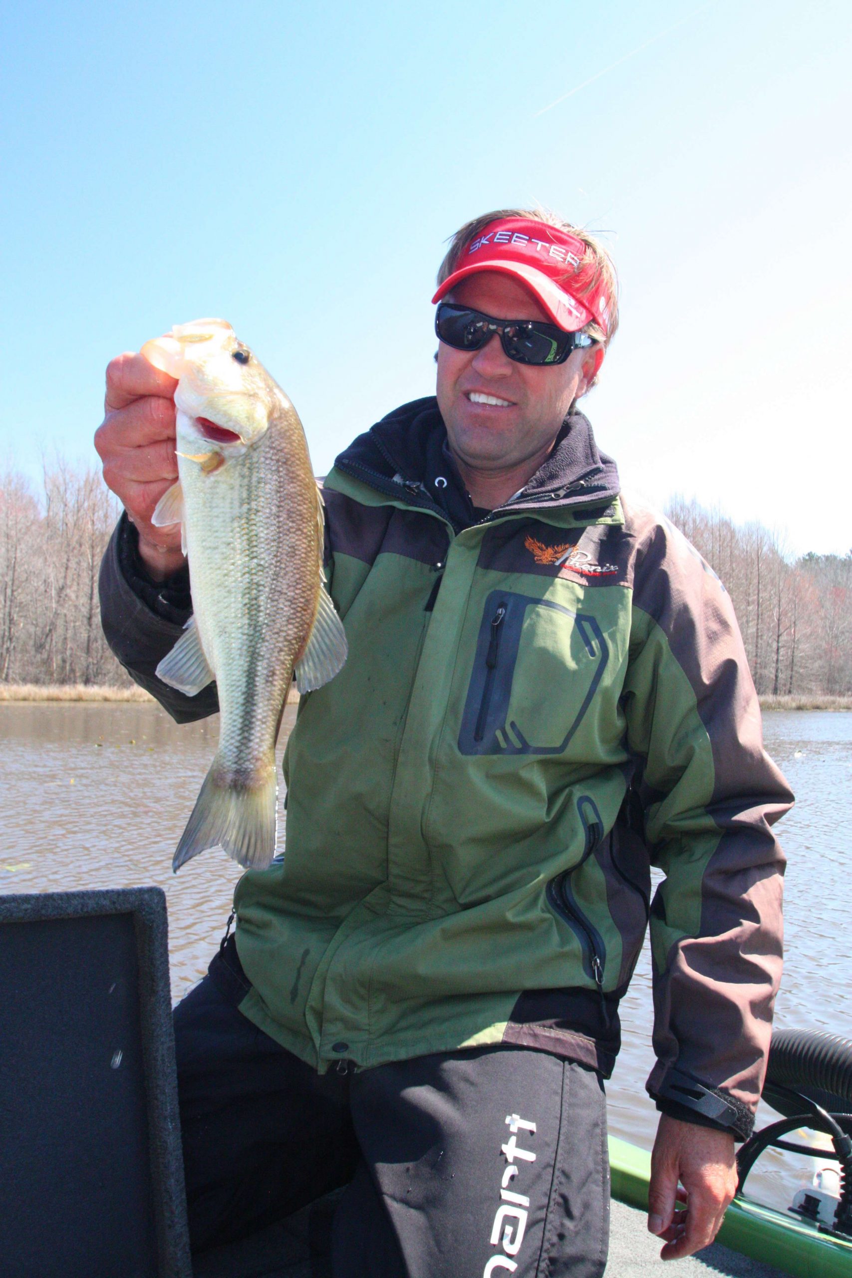 11:20 a.m. Shortly after relocating to the upper end of Lake J, Pirch bags a 1 1/4-pound keeper on a football jig. 