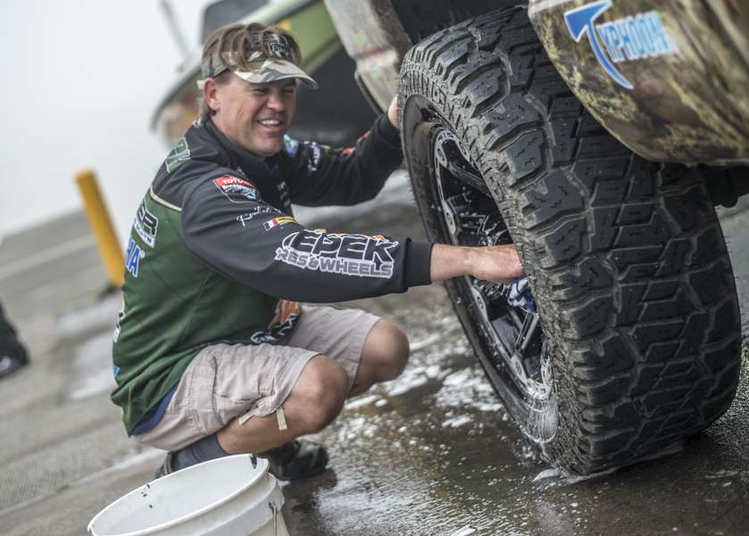 Pirch pulled his boat out of the water and started washing his rims! Talk about multitasking! 
