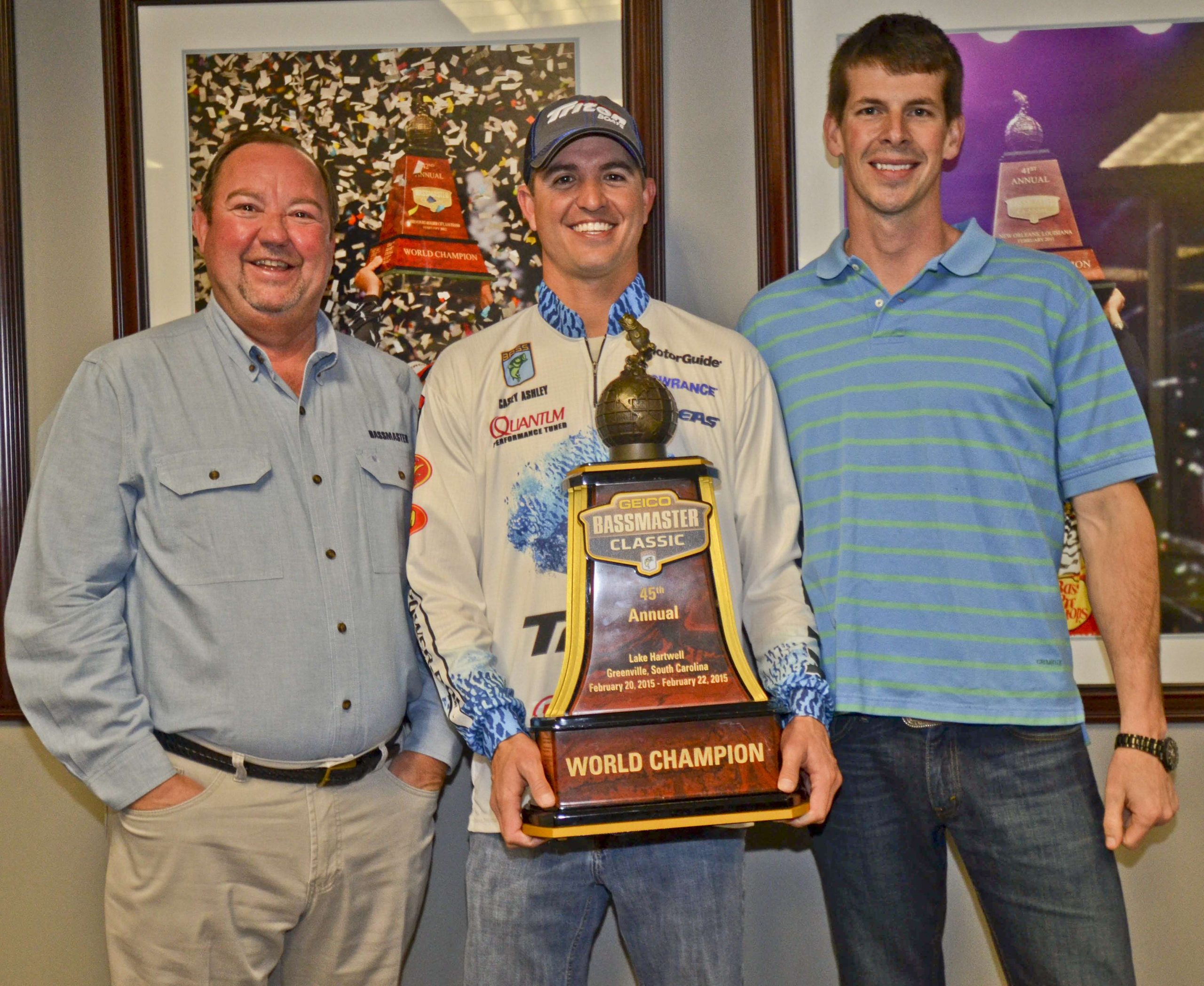 Ashley brought in his prized Classic trophy and posed for photos with CEO Bruce Akin and David Hunter Jones, managing editor of B.A.S.S. Times.