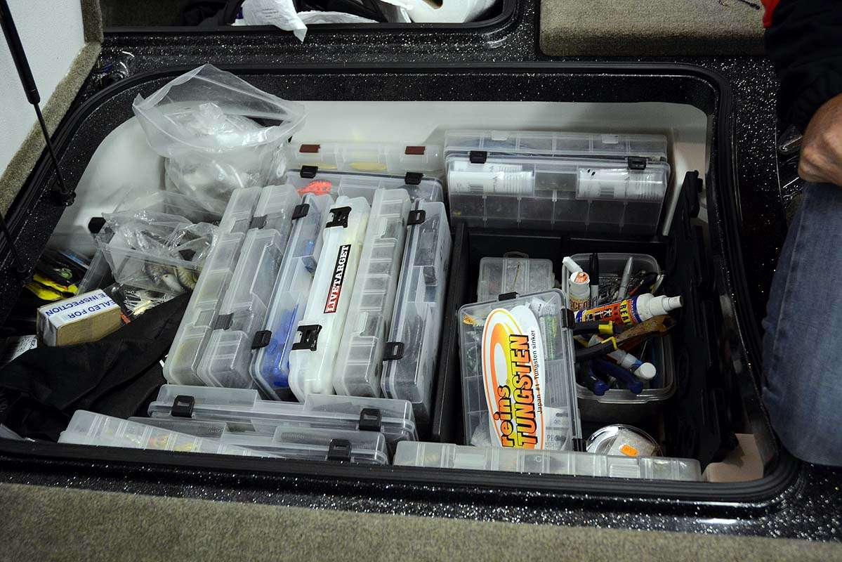 The Catch All box is stored for convenience where it will be used the most. Walker is in the middle of reorganizing the spacious compartment, following the Bass Pro Shops Bassmaster Southern Open on the Kissimmee Chain. What you see is the aftermath of a weekâs competition in Florida. 