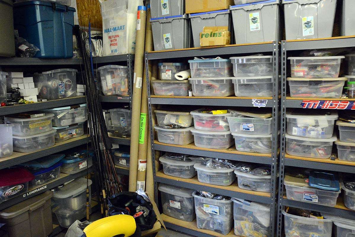Walker uses these storage boxes to organize a wide array of lures and terminal tackle. An exception is the Wal-Mart box at left on the top shelf. Inside is a box of treasures from the past. 