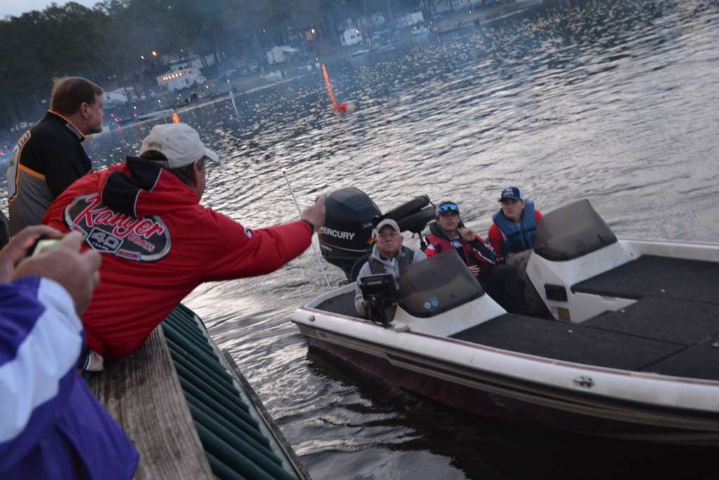 As anglers motored by the pavilion on their way out of Cypress Bend Park, they received their boat number from tournament officials.