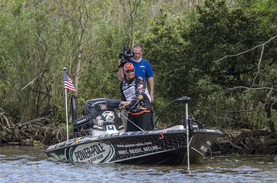 With a smile on his face, Lane unhooks the fish knowing he now has a strong chance at victory. 