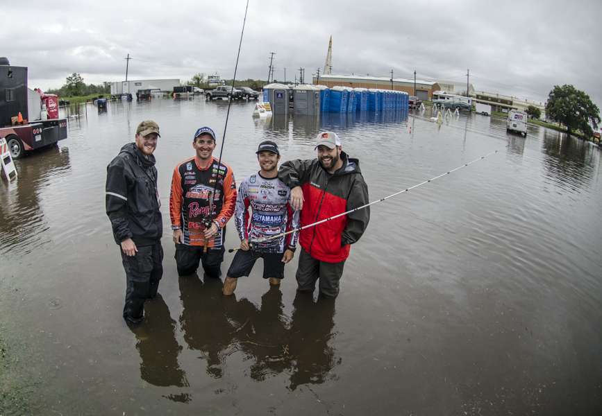 A tired, wet group of guys after a full day at parking lot pond. 