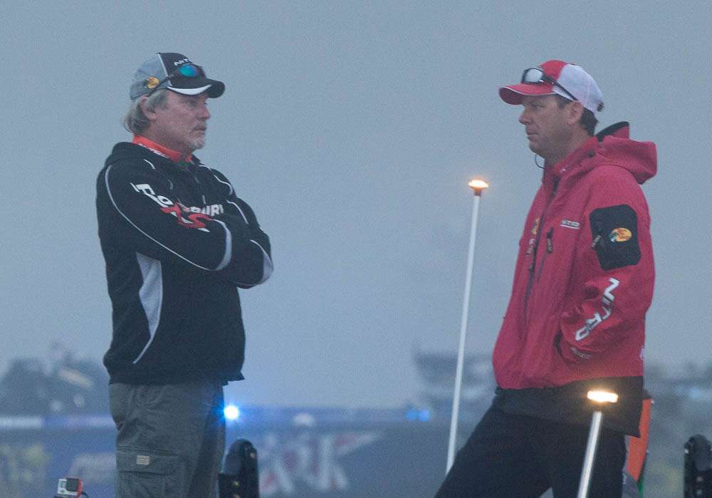 Dennis Tietje and Kevin VanDam wait in the thick fog.