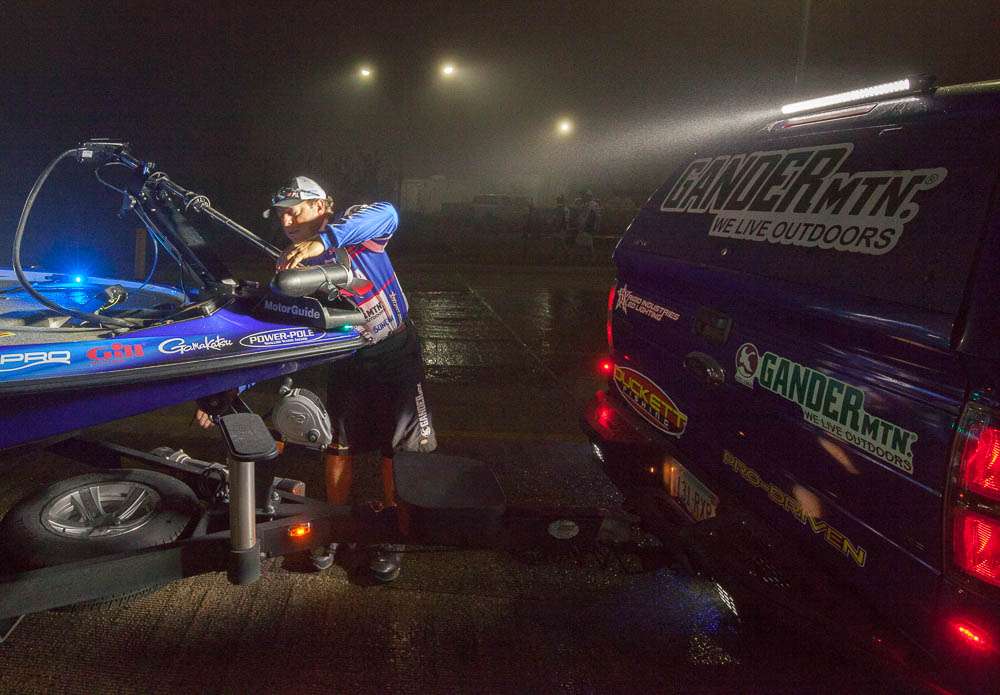 This is probably the best example of why you want a light on the back of your truck. Dean Rojas uses it to check his trolling motor.