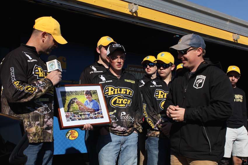 Tournament Manager Hank Weldon is honored prior to weigh-in by Riley's Catch anglers for his contributions to youth fishing. 