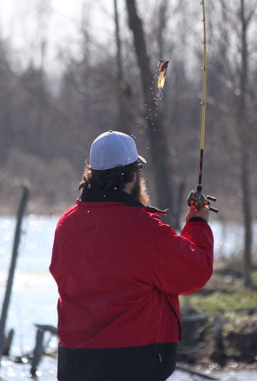 Fishing jigs and soft plastics, anglers try to tempt the lethargic post from bass into biting. 