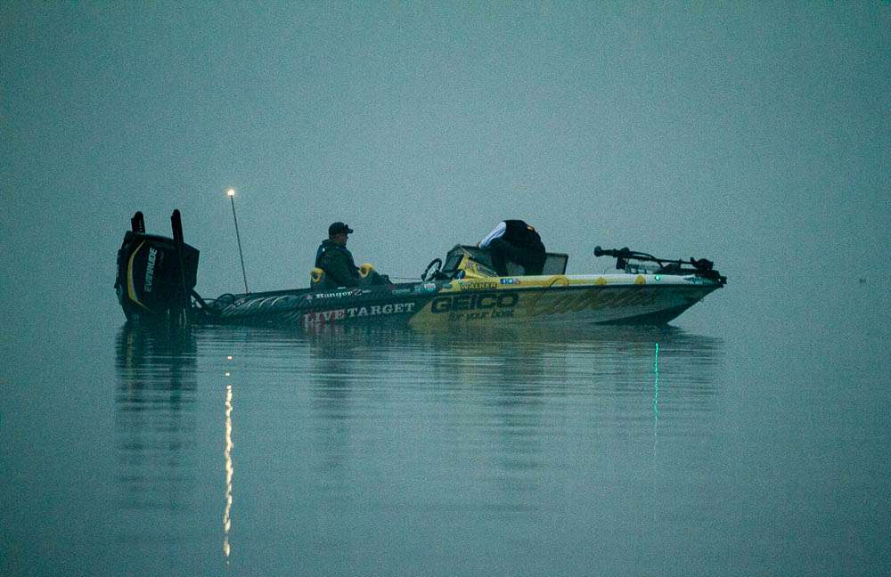 David Walker's boat is enveloped in the pea soup that's holding up Day 1 of Bassmaster Elite at Sabine River Presented by STARK Cultural Venues.