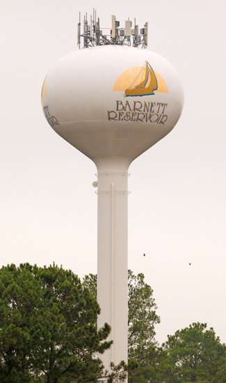 Have you ever seen a water tower with this many antennas on top of it? 