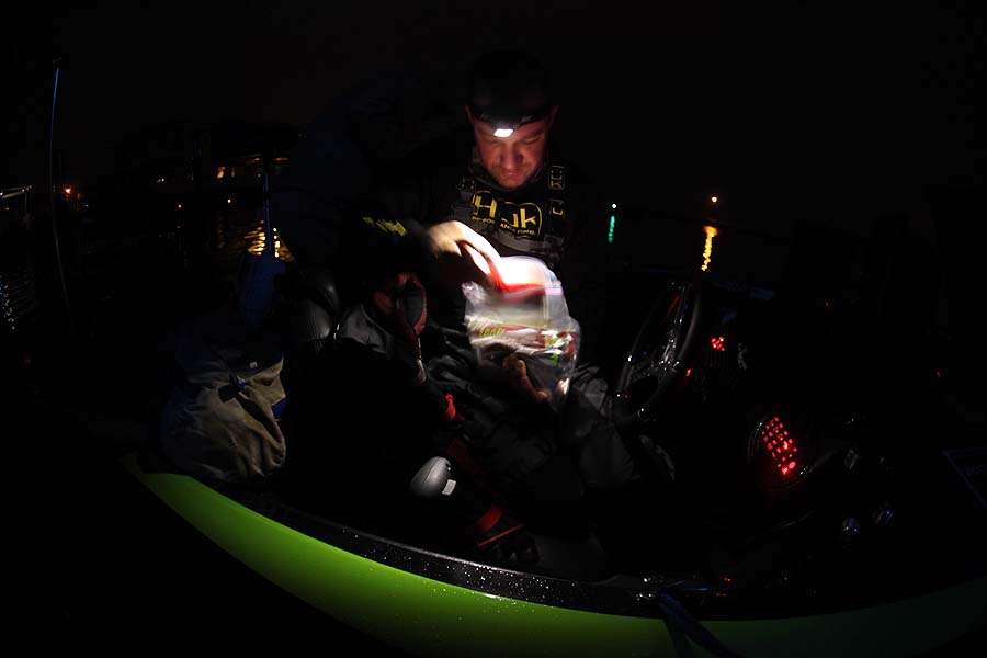 Brent Chapman's headlamp shines on the baits he plans to use. He's one of five former winners in the top 12 from the Bass Pro Shops Bassmaster Opens.