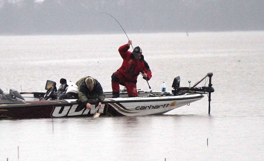 Preuett's co-angler assists with the catch.