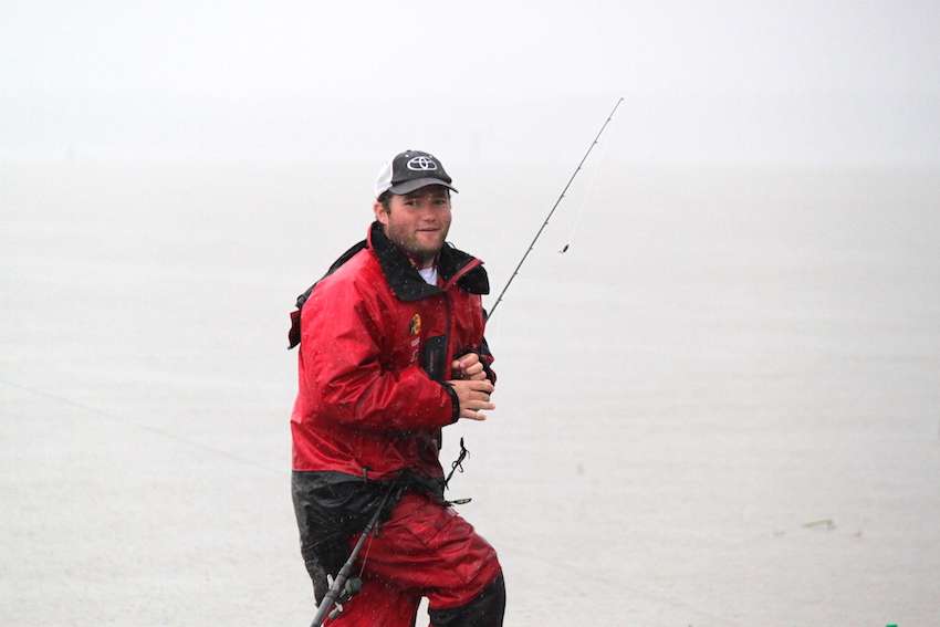 Smiles for Preuett as the rain knocks the visibility to zero out in the river channel.  