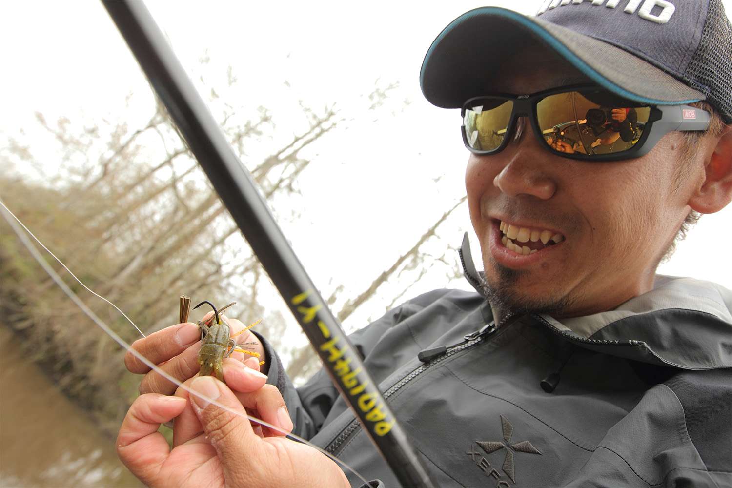 After another bite, he showed that a bass had nibbled the Gary Yamamoto Craw.