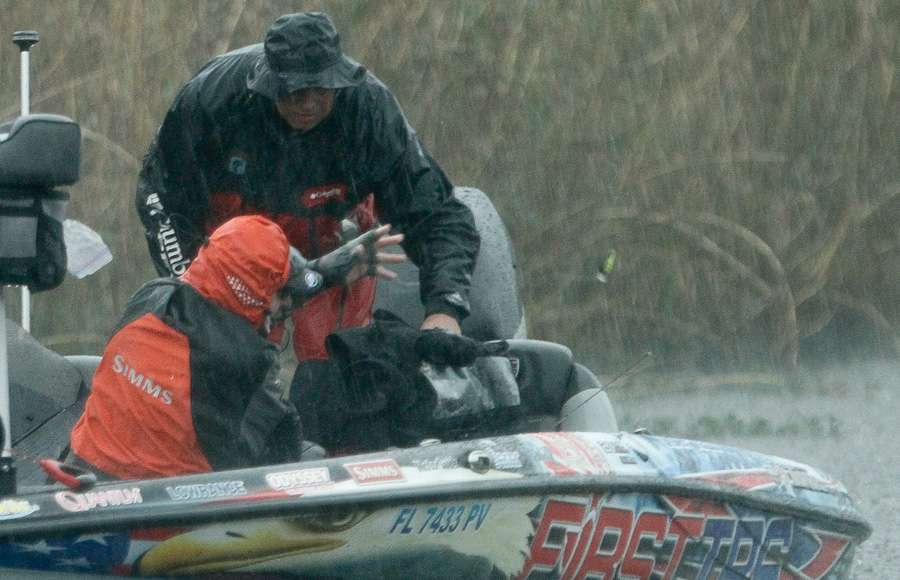 Shaw Grigsby is obviously throwing a crankbait from the boat with his hand.