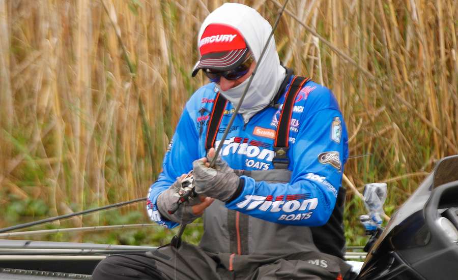 Grigsby quickly attaches a reel to the new rodâ¦