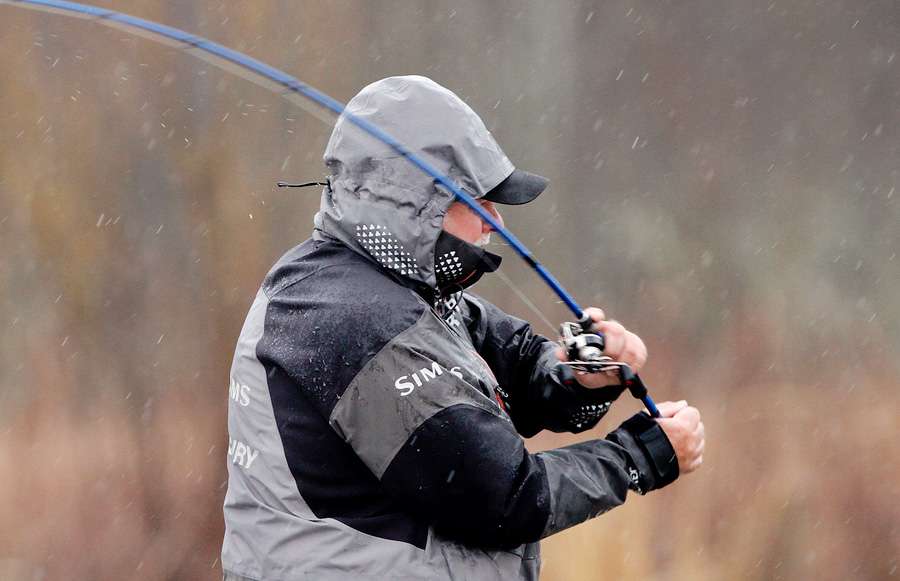 Tommy Biffle has fished in the rain before. Just another day at the office for the veteran of many B.A.S.S. wars. 