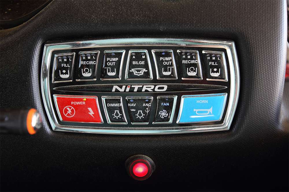 The Z21's control center is a simplified touch pad. Note the glowing red button below; it controls the Rigid lights throughout the boat.