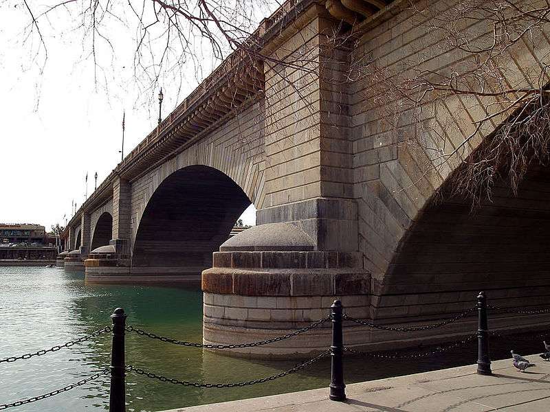 London Bridge is second most popular attraction in Arizona after the Grand Canyon. Visitors can take a walking tour and see World War II strafing scars in the bridgeâs granite. The area is also popular with boaters, but with heavy traffic, not so much with anglers. (Wikipedia/Jon Sullivan)