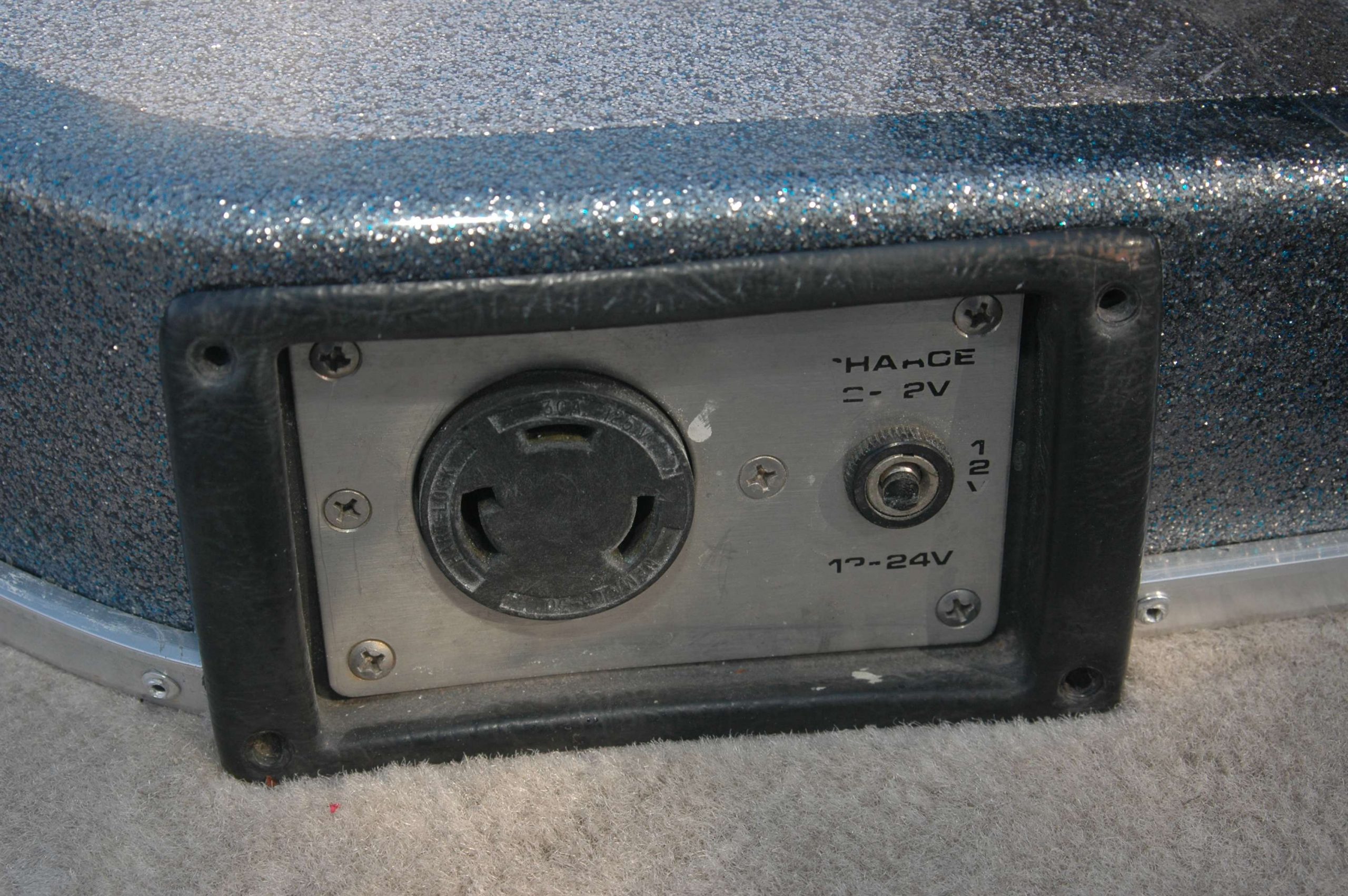 To accomodate 12- and 24-volt motors, the boat had two sets of 6-gauge wires attached to the outlet.
