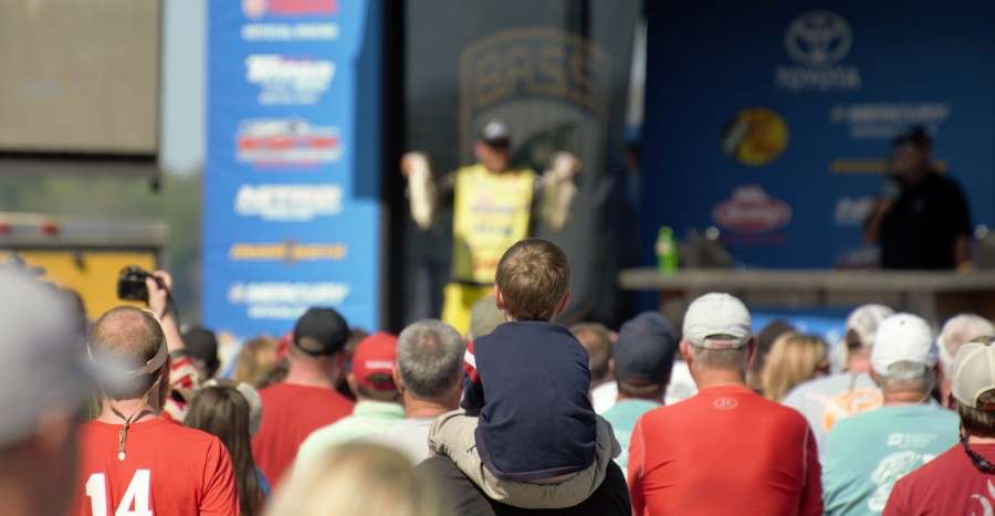 Skeet Reese shows his big bass off to a crowd of excited fans.