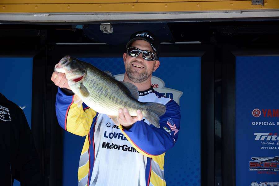 Jeremiah Hofstetter weighs a big bass to help secure second place on the Colorado team with an overall weight of 15-4.