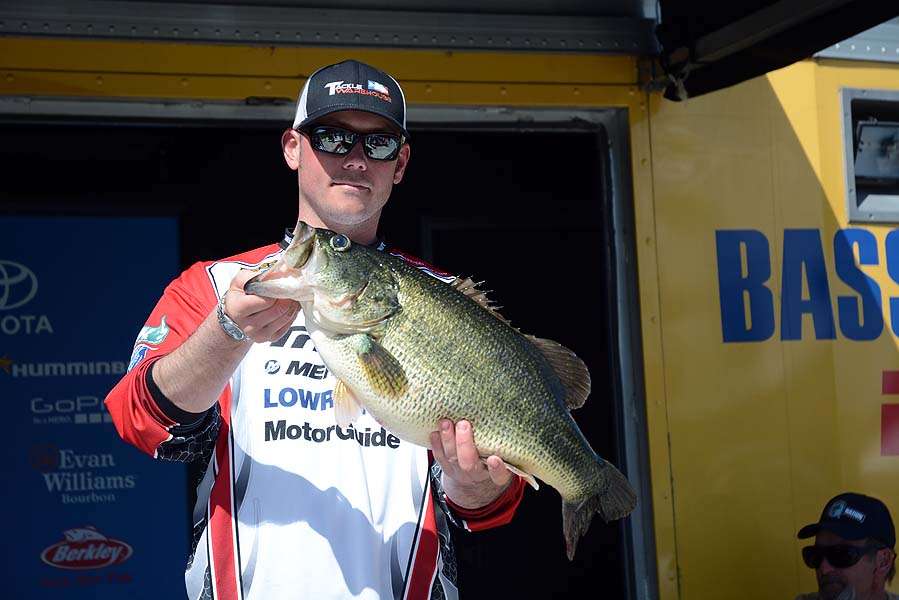 Addam Gross with the biggest bass of the day weighing 11 pounds. 