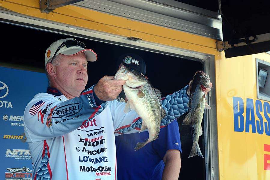 Lee Byrd of Alabama weighs his catch. 
