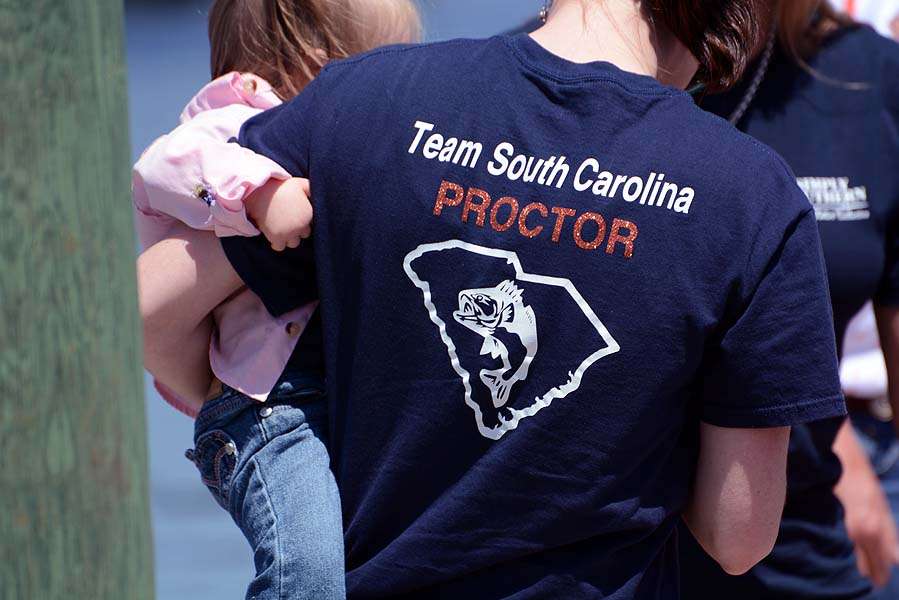 Team Proctor shirts are worn by the family of eventual winner, John Proctor. 