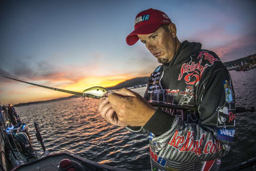 Keith Combs shows the camera the bait that he has been throwing around the many bridges of Lake Guntersville. 