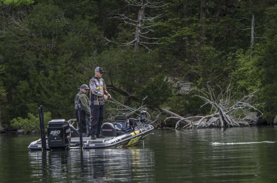 Vinson brings the fish to the boat. 