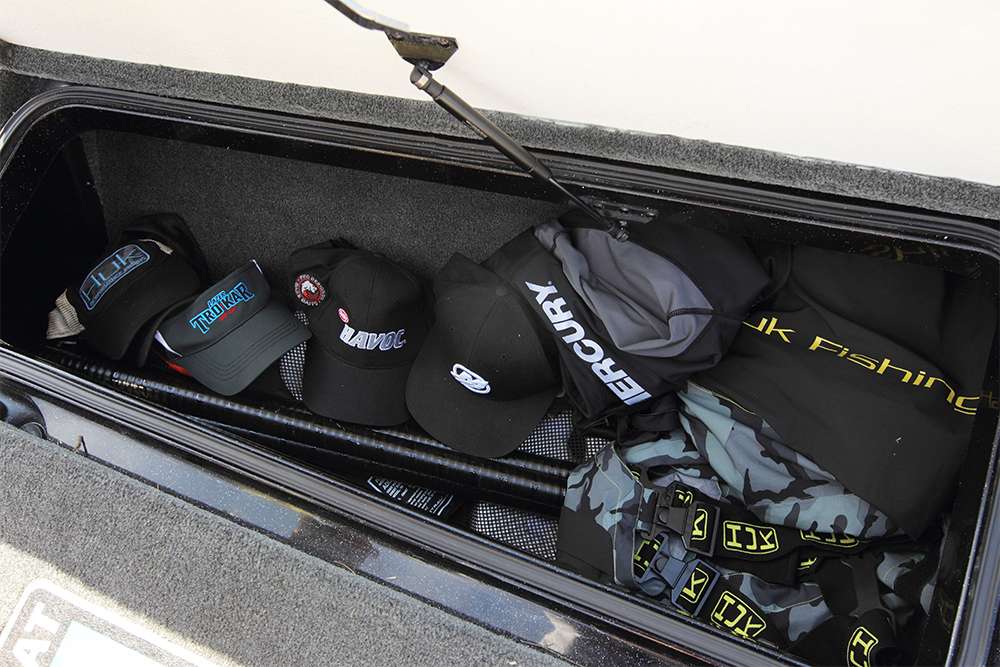 The right rod locker is for lighter items like rain gear, sweaters, hats, a push pole and spare life jackets.