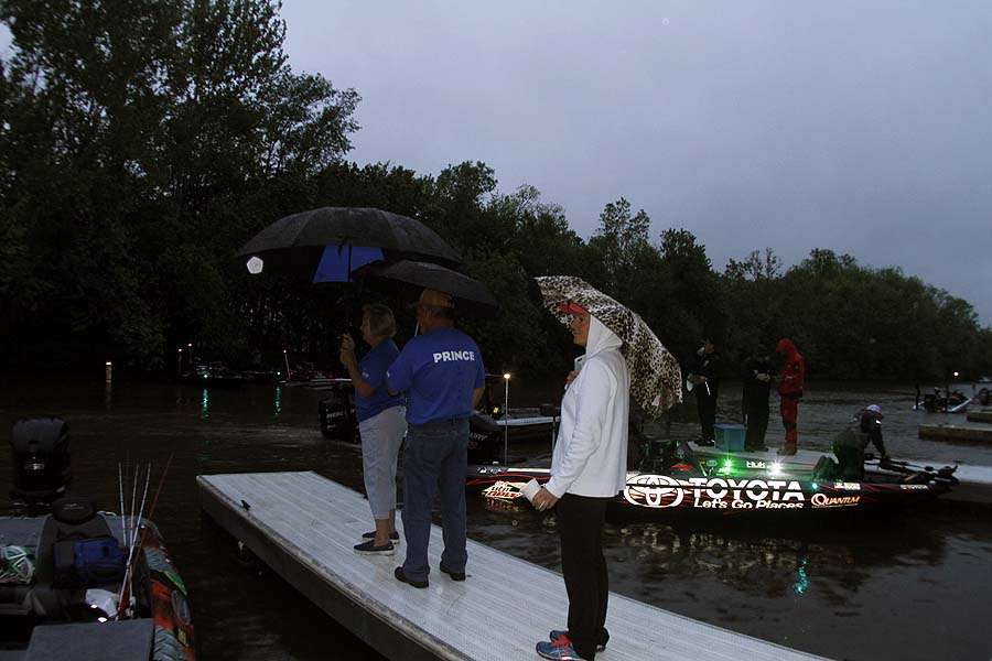 Fans of Bassmaster Elite Series pro Cliff Prince brave the rain to cheer on their favorite. 