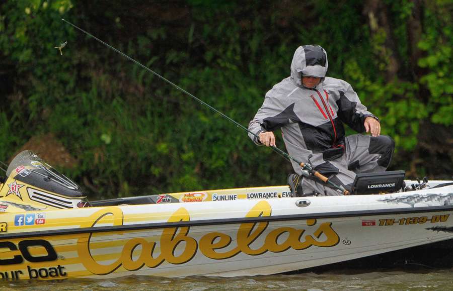 Walker changes rods to try a different bait.