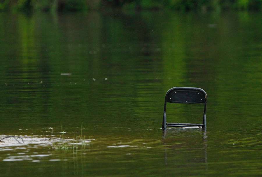The water had risen substantially overnight; yesterday this chair was on dry ground.