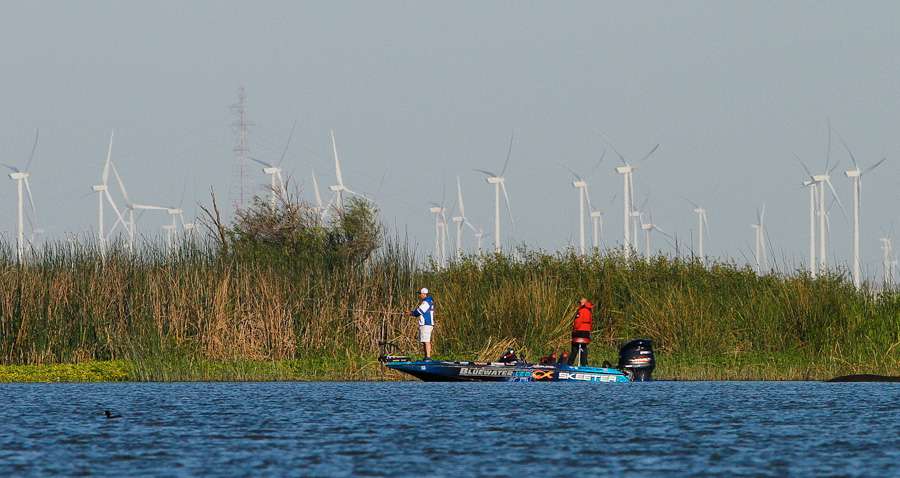 The windmills behind Alton Jones would get a workout on Day 1. The wind began to blow early on the Delta. 