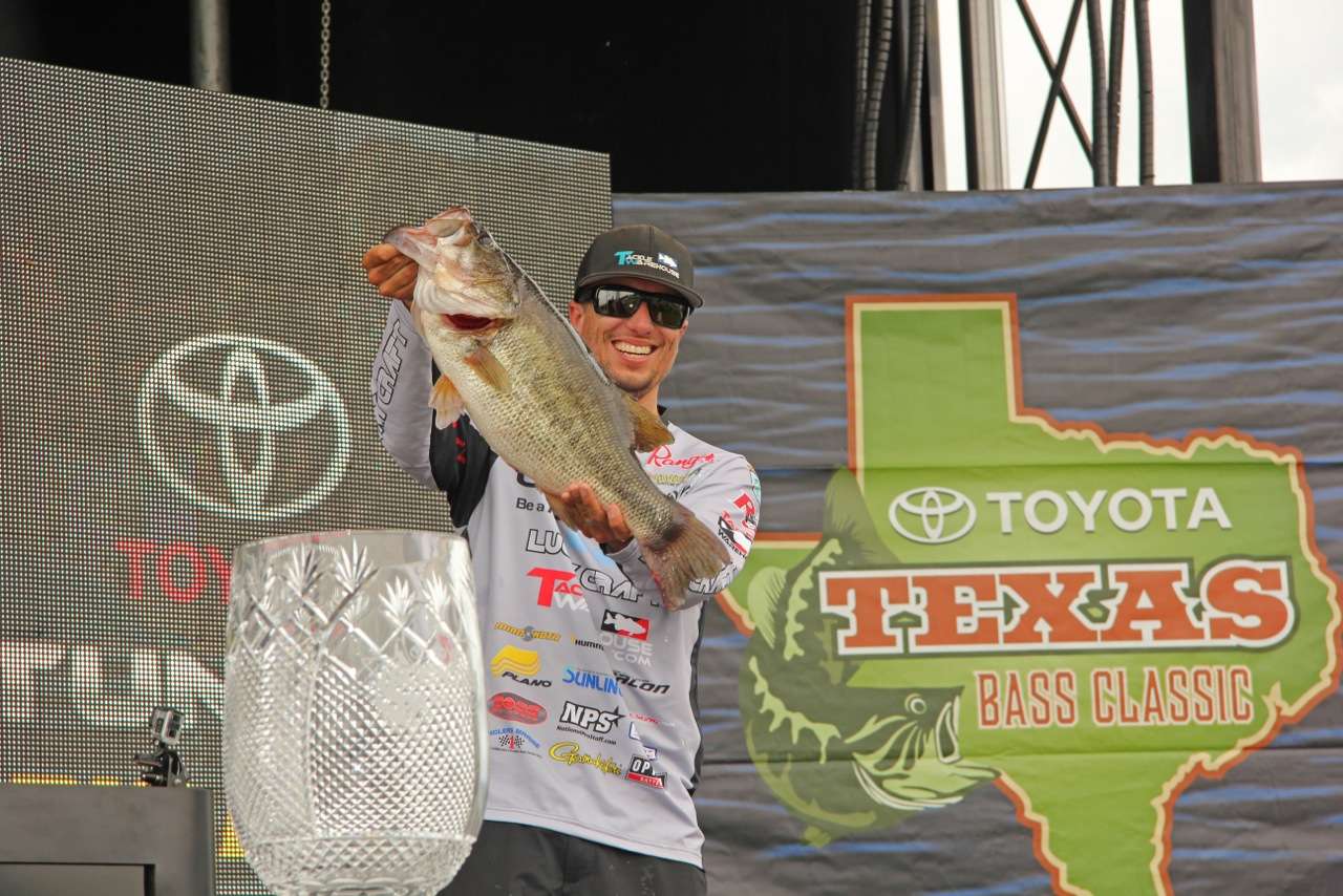 Ehrler holds the 10-pounder up on stage that ultimately sealed victory for him.