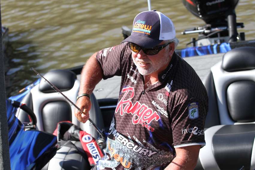 Tommy Biffle stores his rods while waiting.