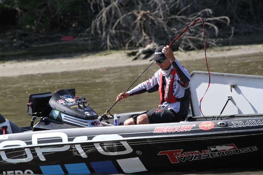 Brent Ehrler takes care of his rods before pulling out.