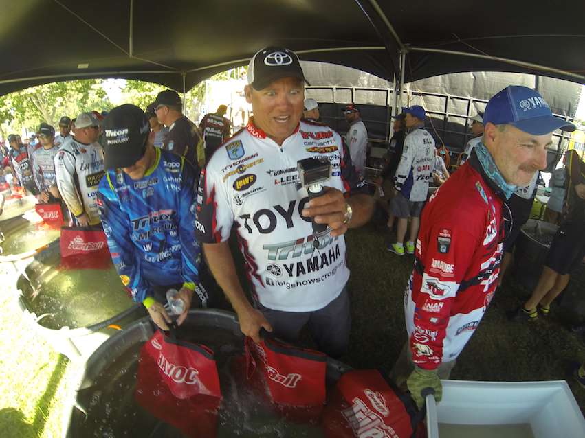 While Terry Scroggins messes with Brent Ehrlerâs GoPro.