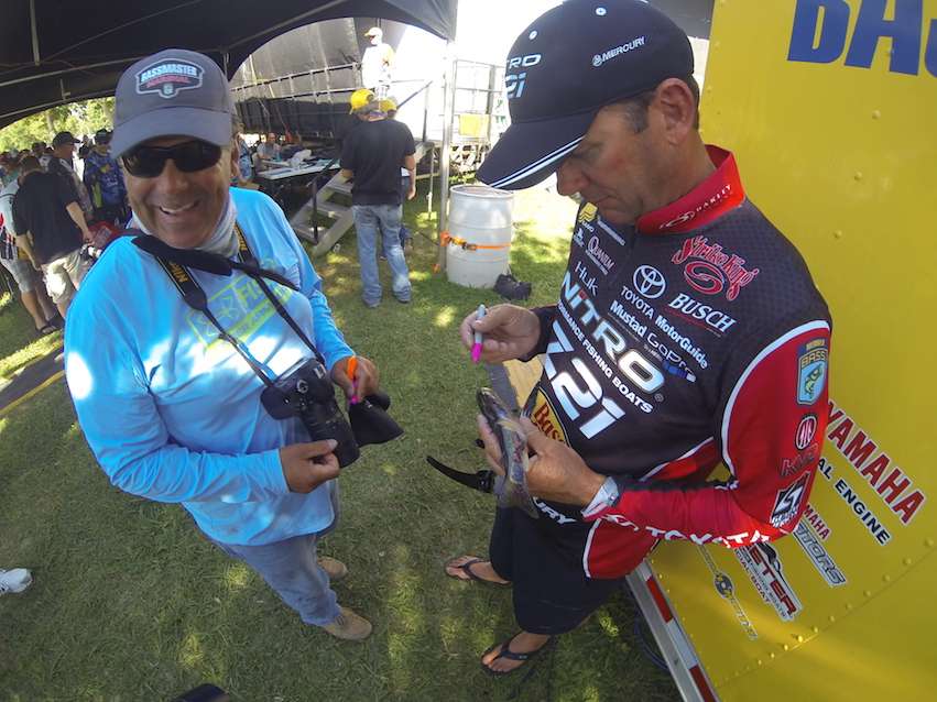Kevin VanDam signs a swimbait for a California fan.