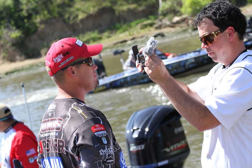 Keith Combs gets interviewed after weighing in 24-13 on Day 1.