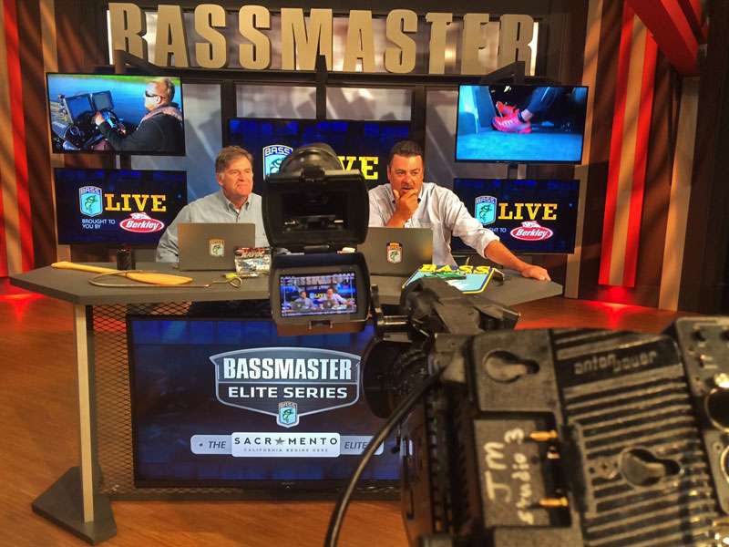 Zona and Sanders monitor a big screen in front of them to see what viewers on Bassmaster.com see. The screens behind them are the four live cameras out on the California Delta for the Sacramento Elite event. This week was the first for LIVE coming from the studio.