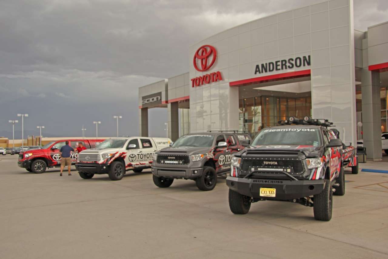 VanDam, Scroggins, Swindle and Iaconelli lined up their rigs from left to right in front of the bass fishing friendly dealership.