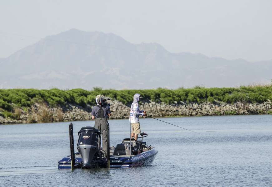 Chris Zaldain makes a few open water casts with mount Diablo in the background. 