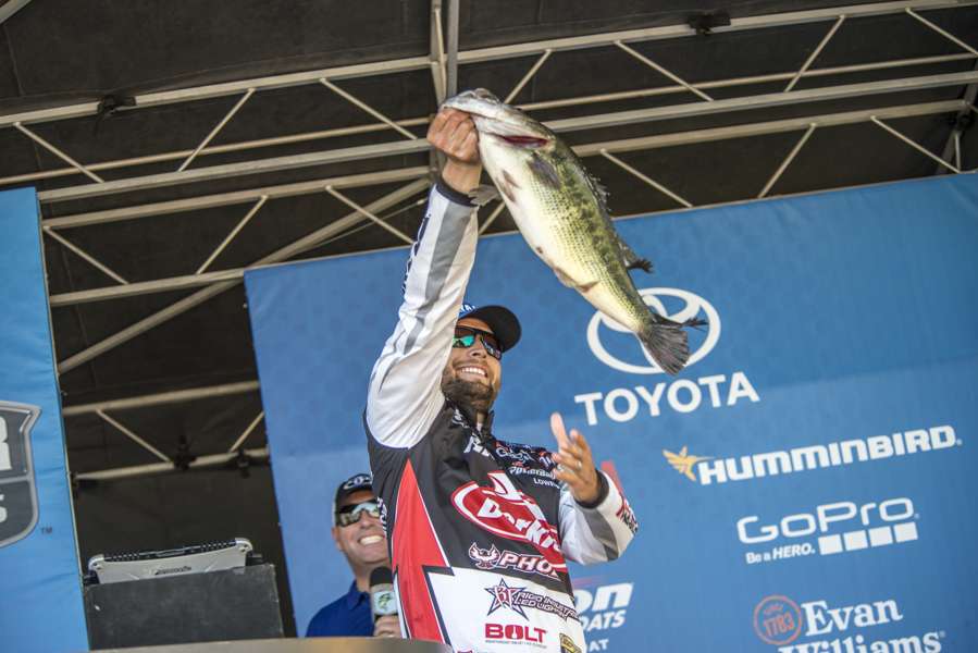 New tournament leader Justin Lucas holds up his Day 3 giant. 